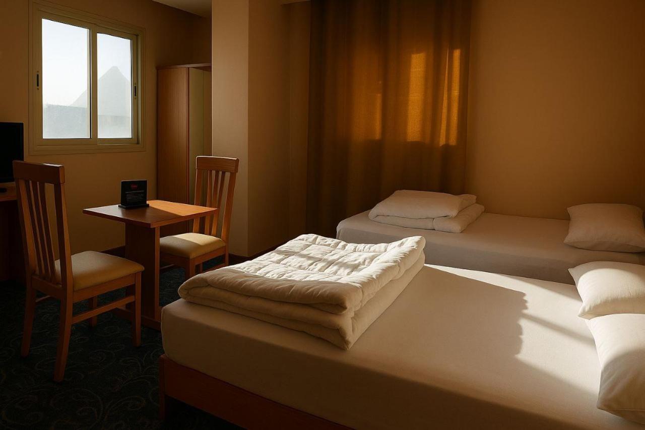 Grand Pyramid View Hotel Kafret el-Gabal Buitenkant foto
